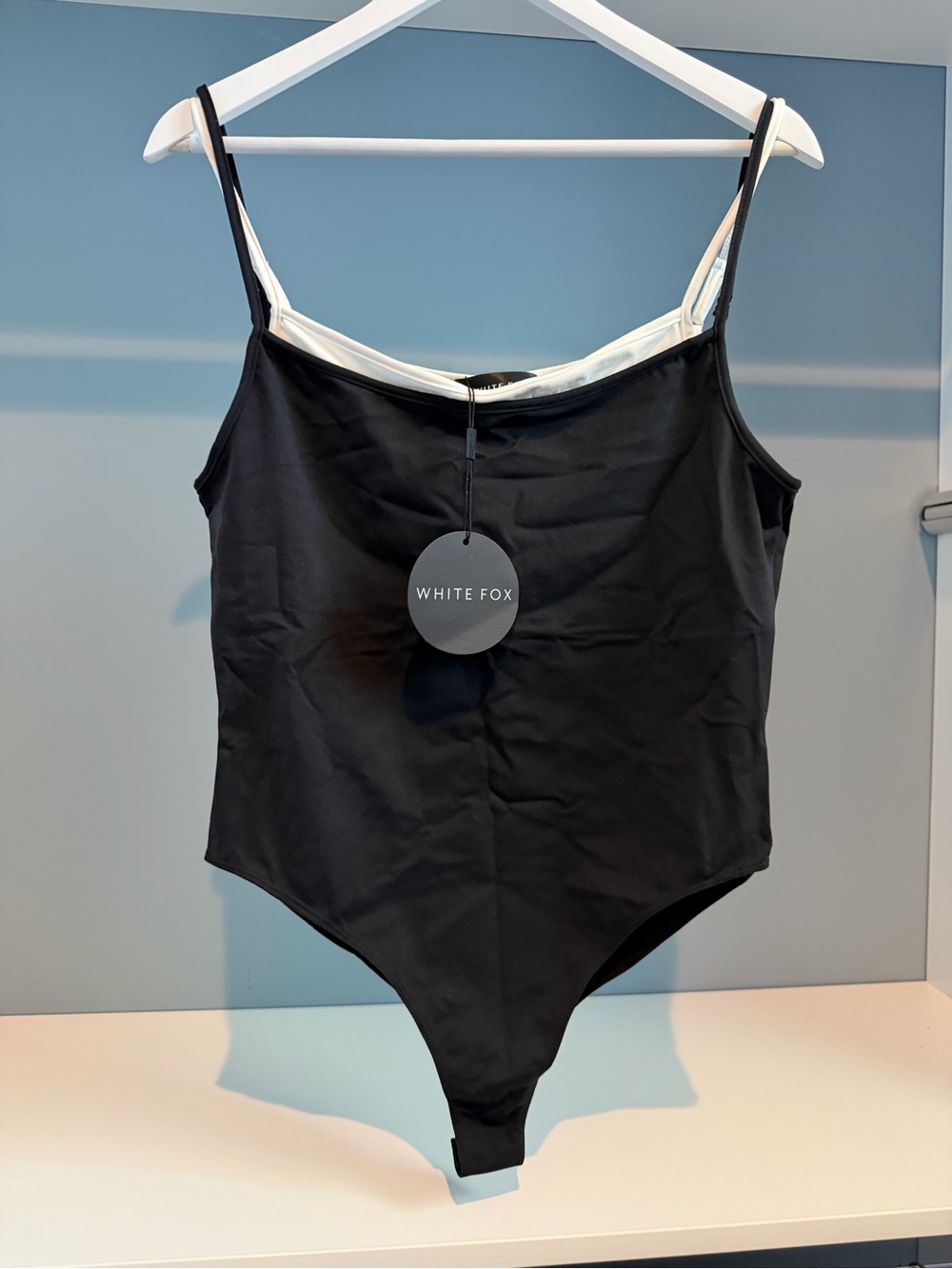 NWT White Fox Boutique bodysuit. Sz large. Black/white. Adjustable straps. NEW!